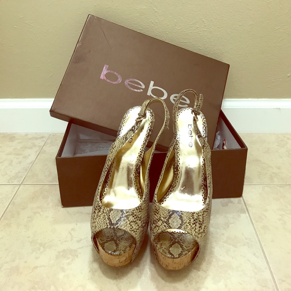 Bebe Snake skin sling back heels