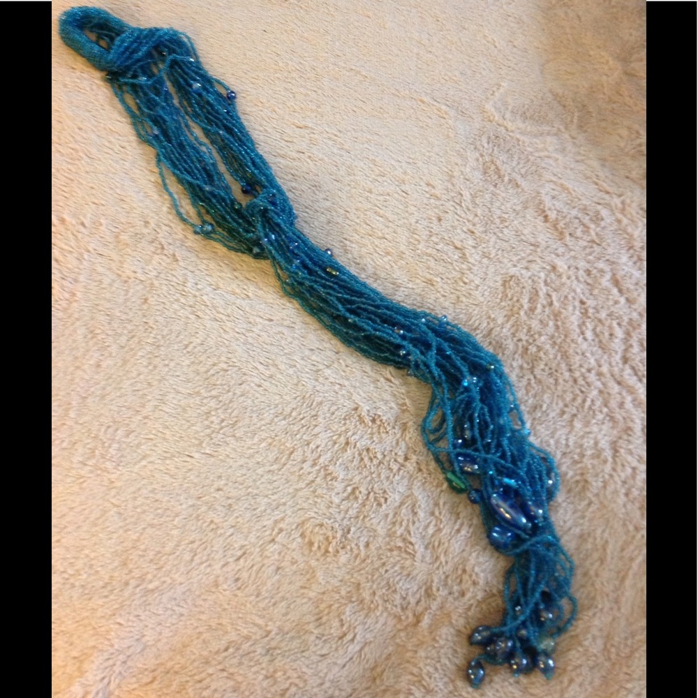 FINAL PRICE Turq multi strand adj beaded lariat.