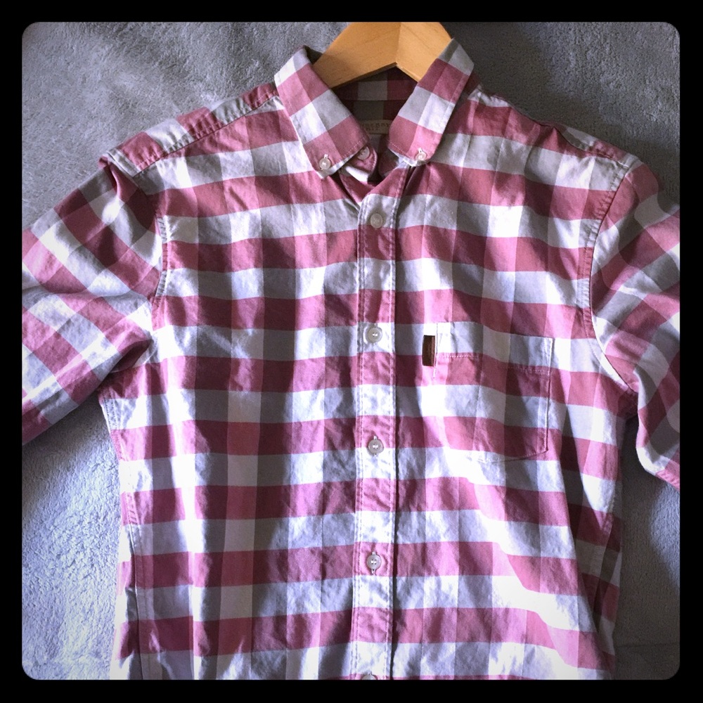Burberry pink shirt.