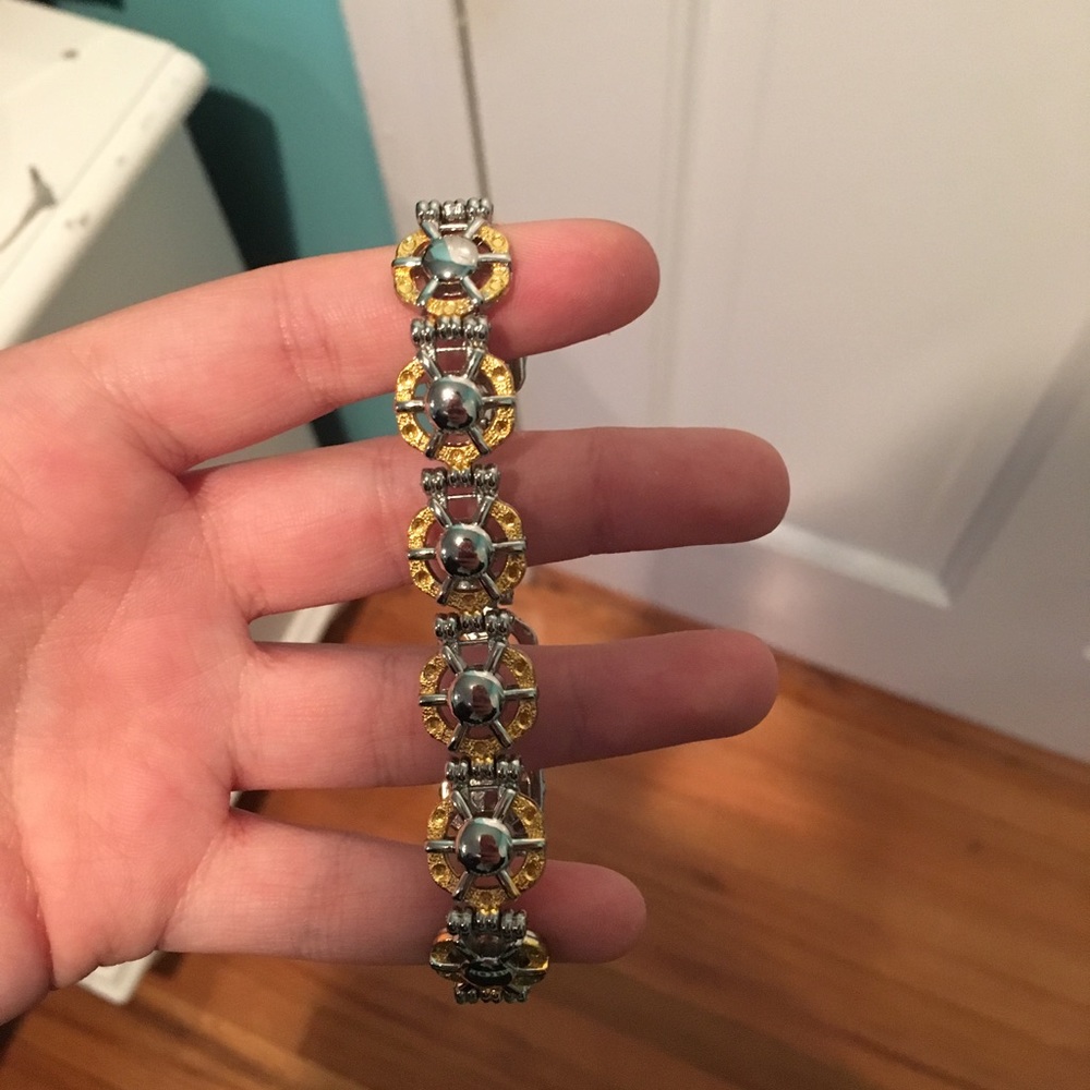 gold and silver steering wheel bracelet