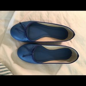 Blue leather flats