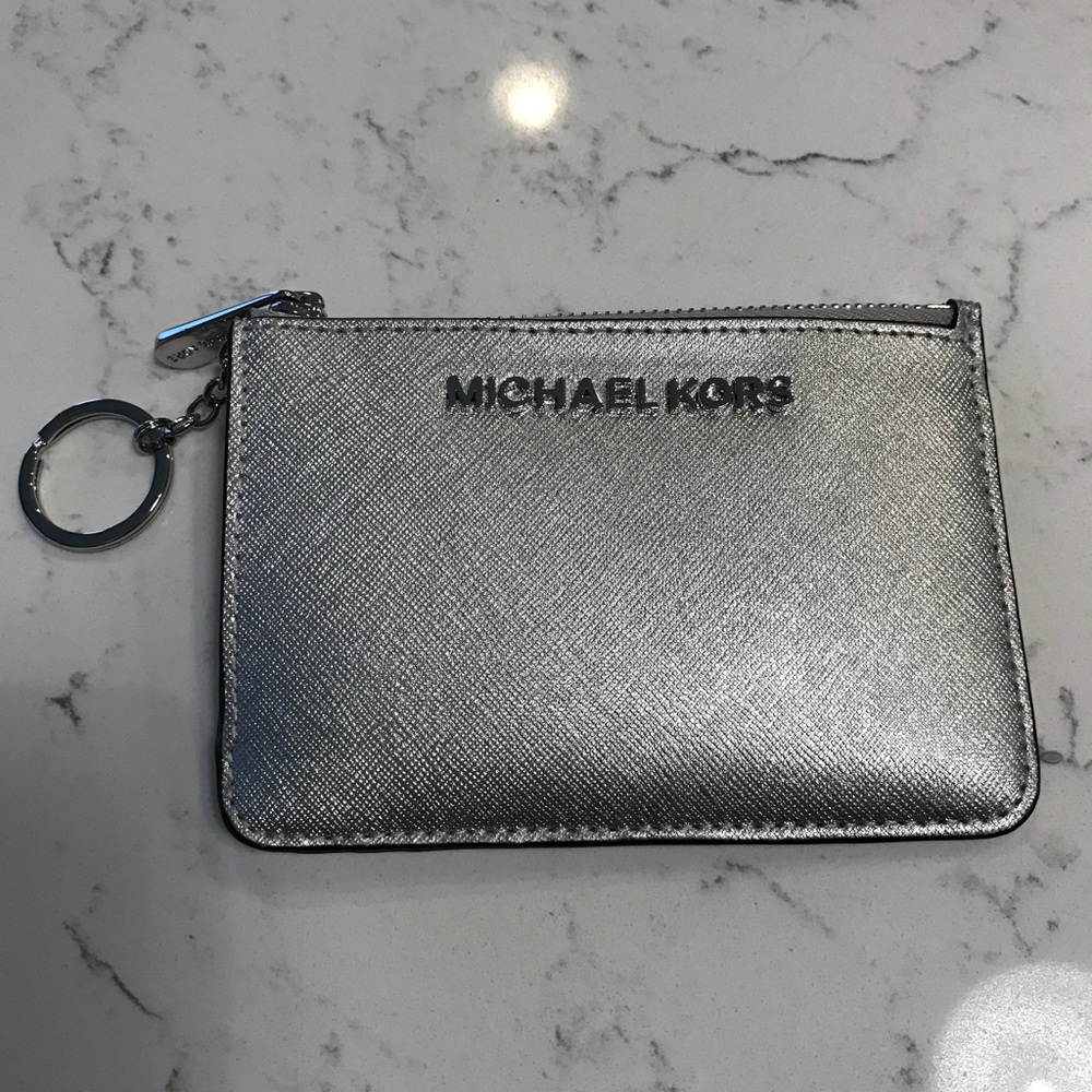 Michael Kors silver wristlet/ id pouch