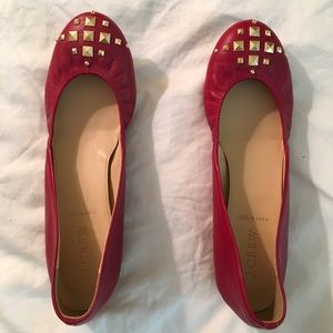 Red leather flats with gold studs