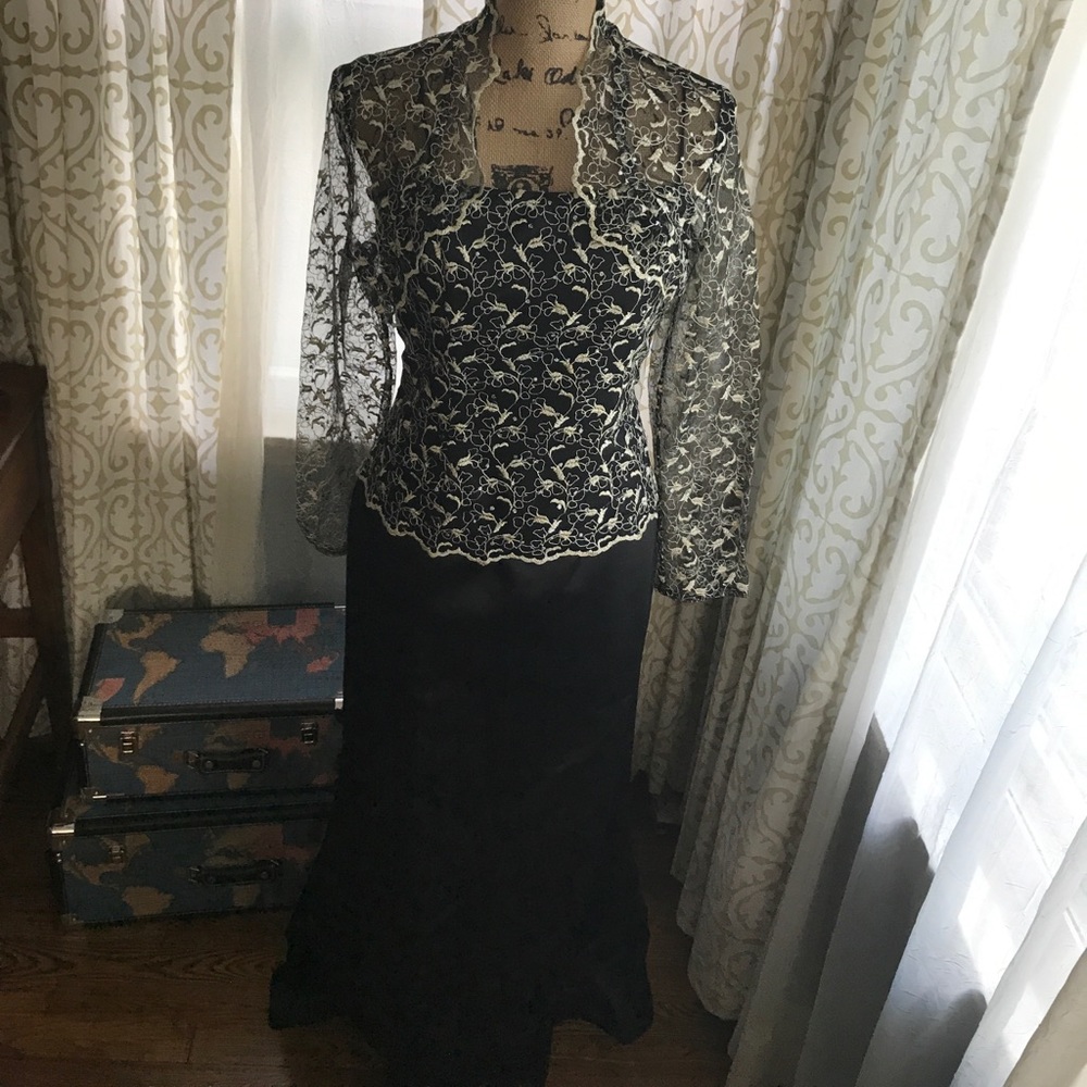 Floor length Black & Gold gown with jacket.