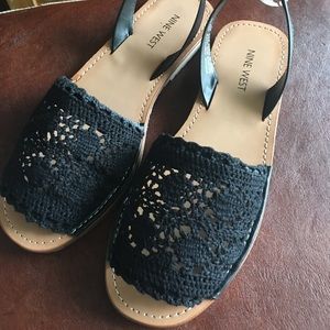 NWOT Nine West black crochet open toe slip ons.