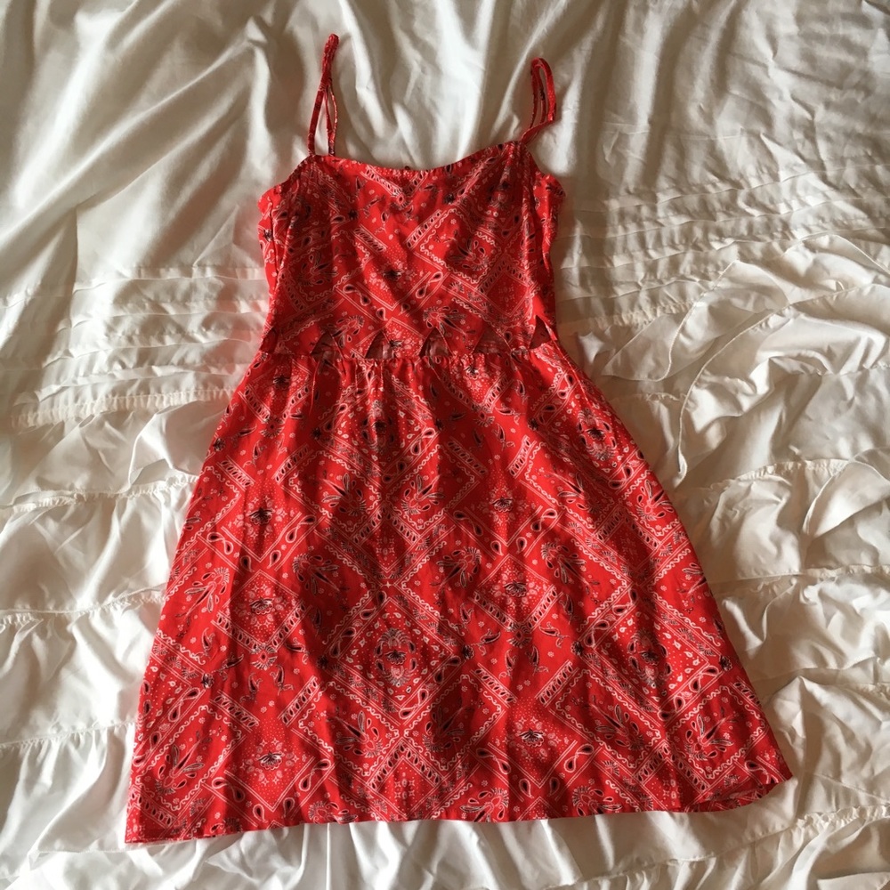 Red bandana patterned dress with slit front.