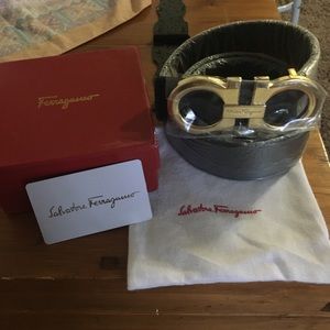Black and gold Ferragamo belt