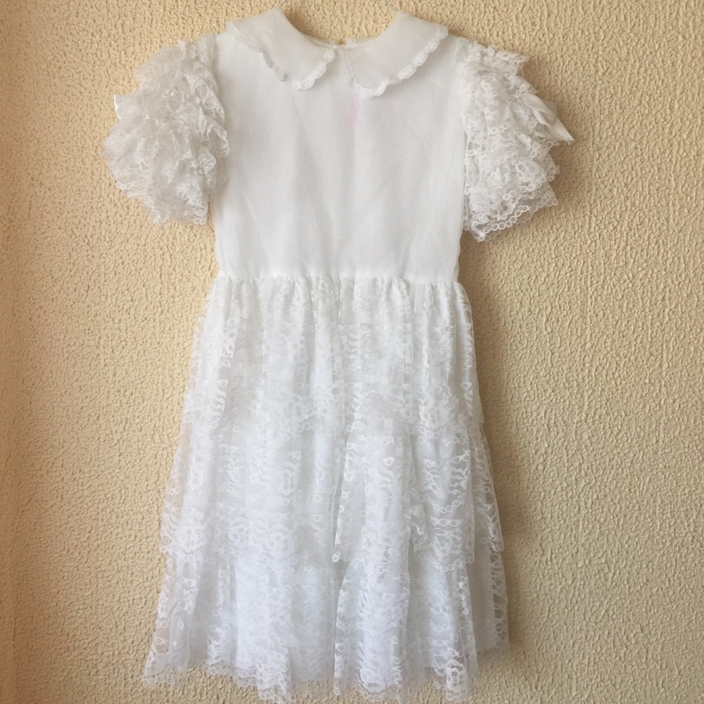 White ruffled dress.