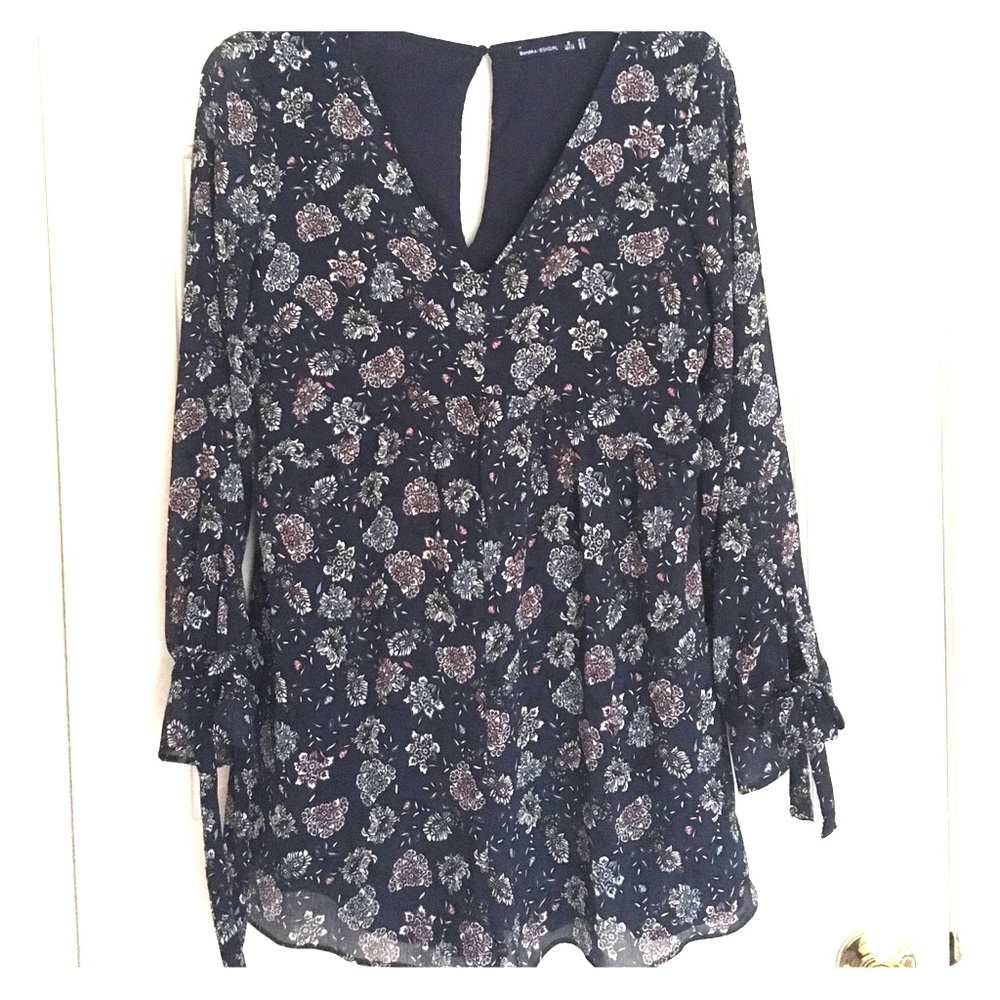 BERSHKA. Brand new casual floral romper.