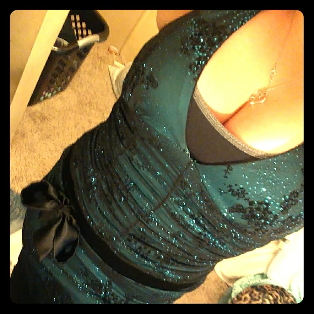 Long, dark blue taboo prom dress with black bow