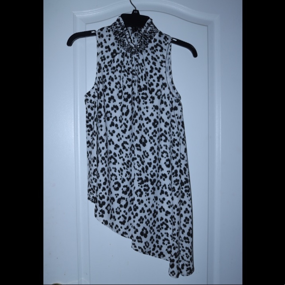 *XOXO💋* 🆕🆕Cheetah print top asymmetrical SEXY