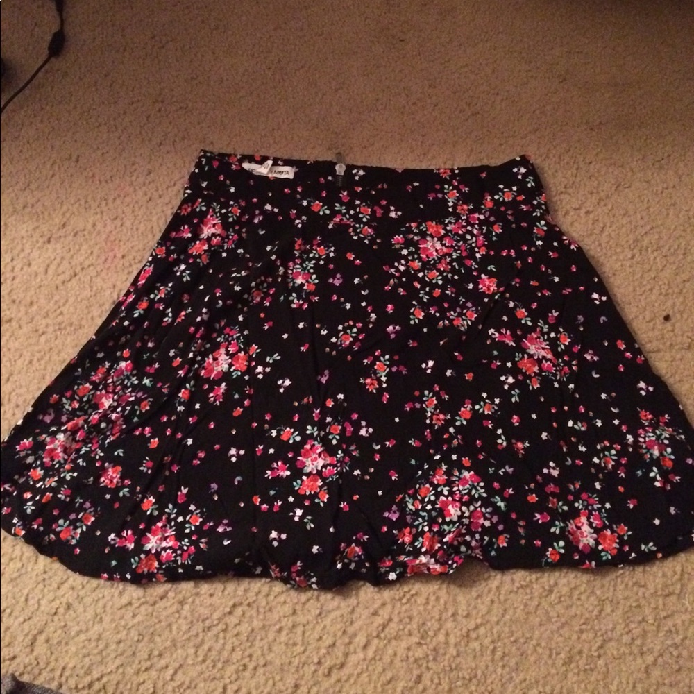 Black floral mini skirt