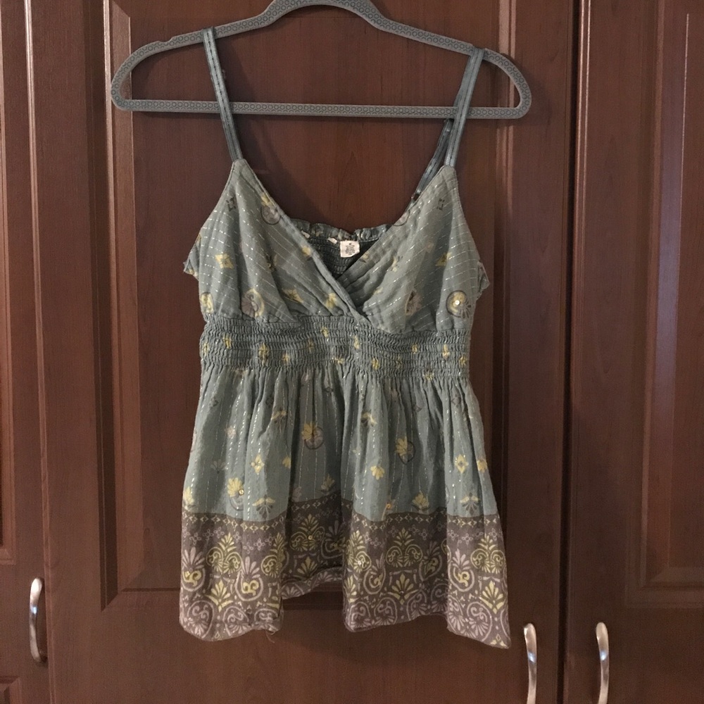 Beautiful embellished tank.