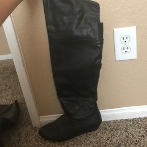 Black leather boots.