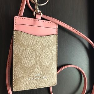 Coach pink and tan name badge holder