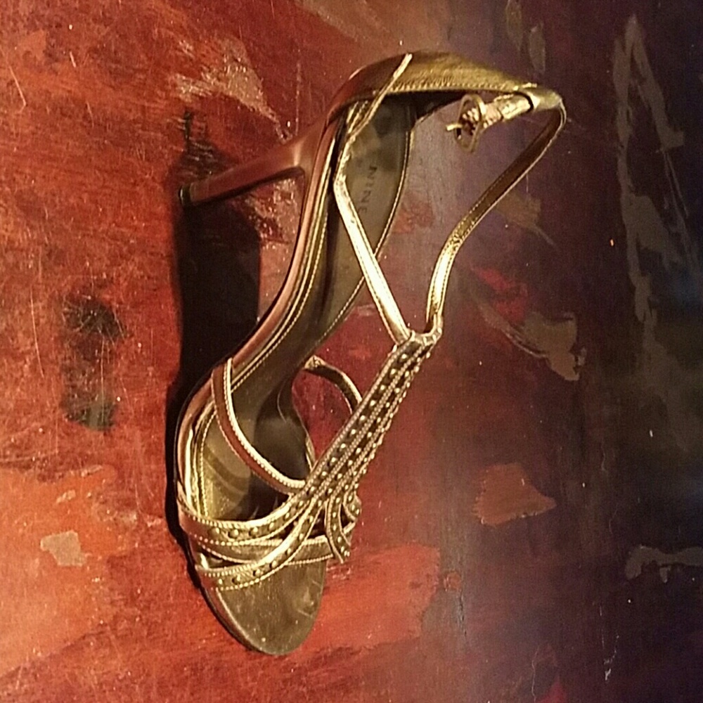 Nice strappy bronze heels. Nine West