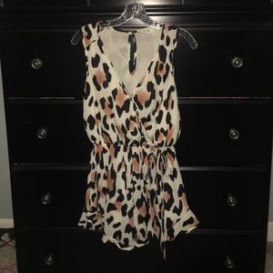 Leopard print romper with tie at waist and frills