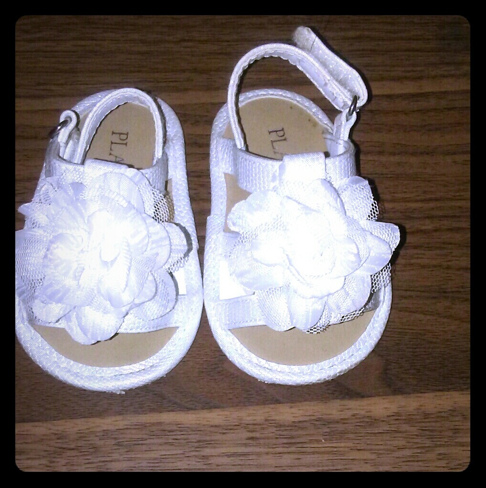 White baby shoes
