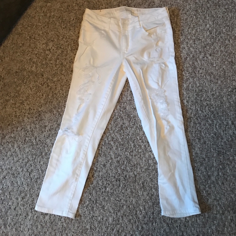 Ripped, cropped white jeans
