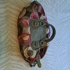 Coach purse. Moderate wear. Some small stains.