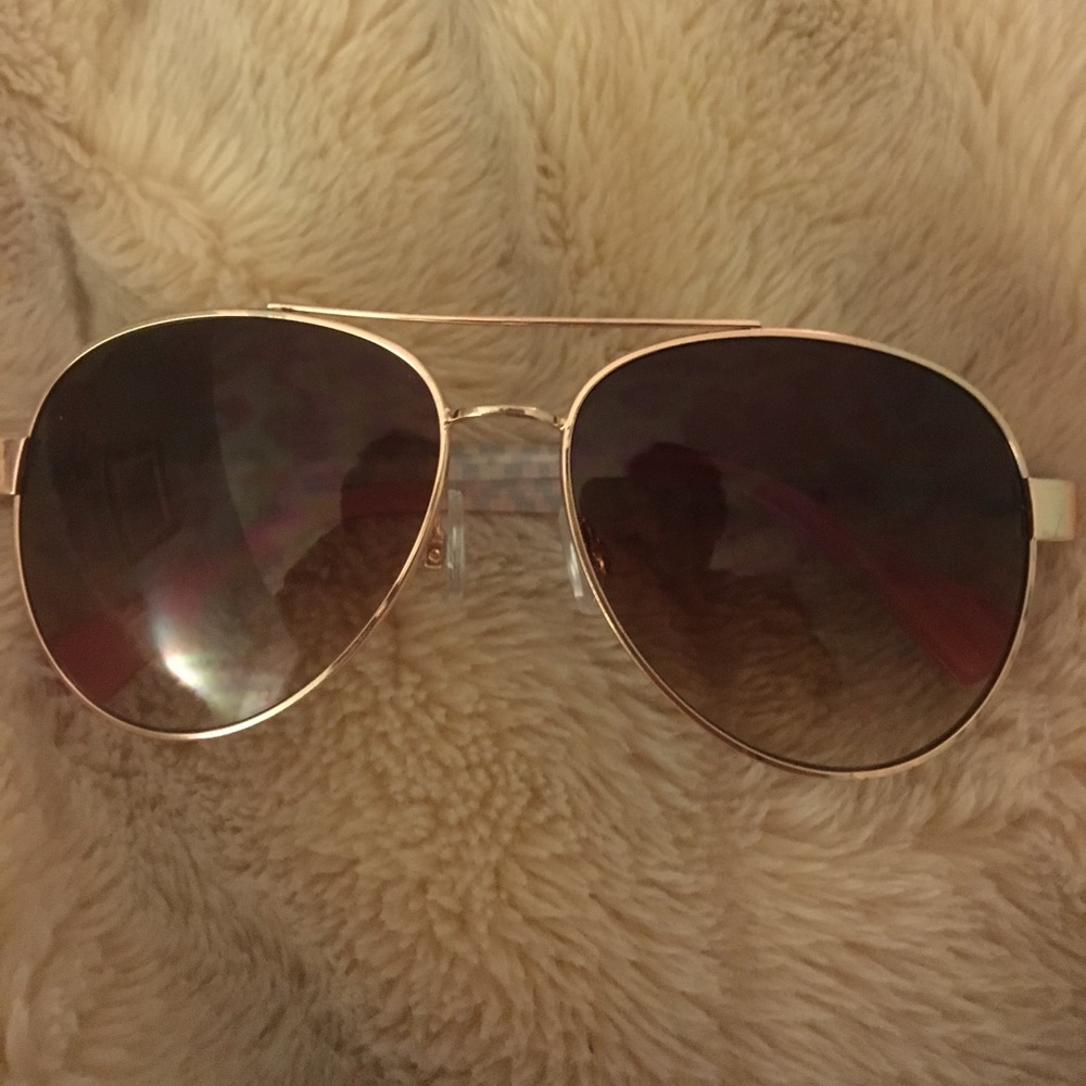 one pair of aviator sunglasses