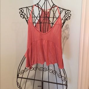 Coral pink tank top with Loose peplum style,