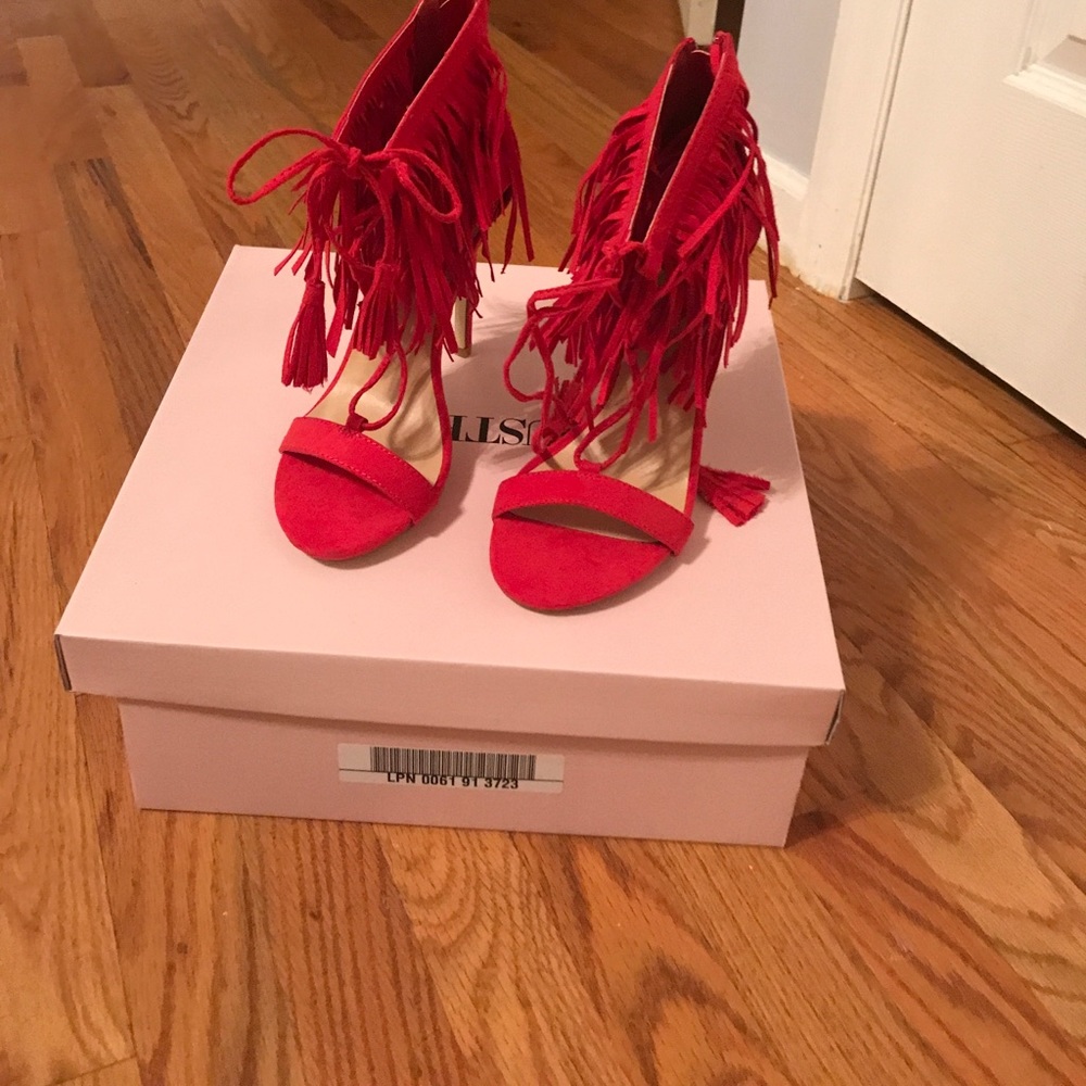 Red funky pumps with fringe