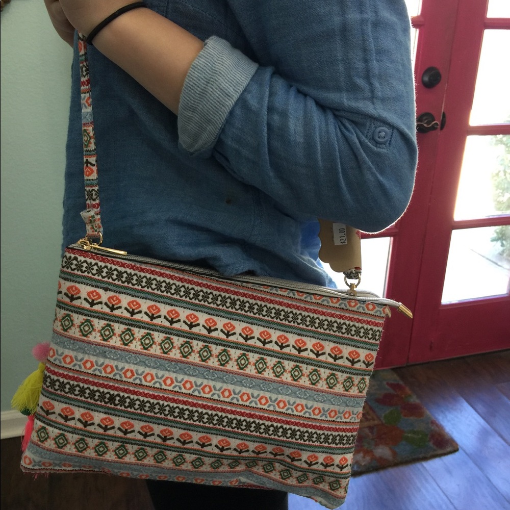 NWT multi colored clutch with tassels