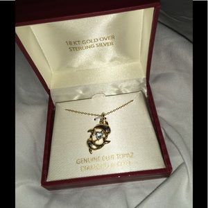 BRAND NEW gold dolphin necklace