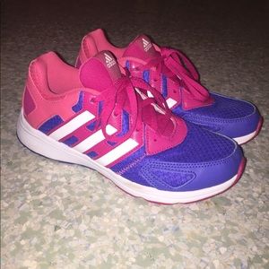 Pink and purple Adidas shoes