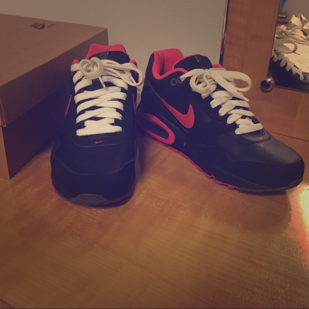 Pink and black Nike Air Max's