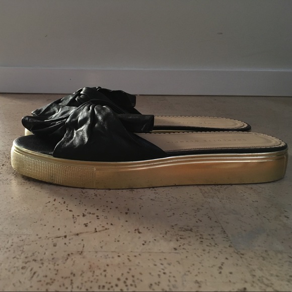 Dolly_Blk_2_1200x.jpg?v=1670890177 Charlotte Olympia black pool side sliders.