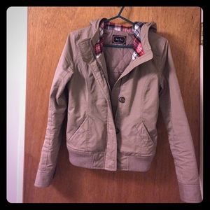 Tan Jacket with flannel pattern lining in hood