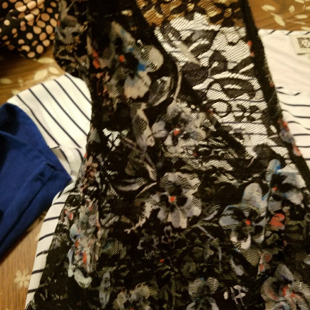2 shirts both XL