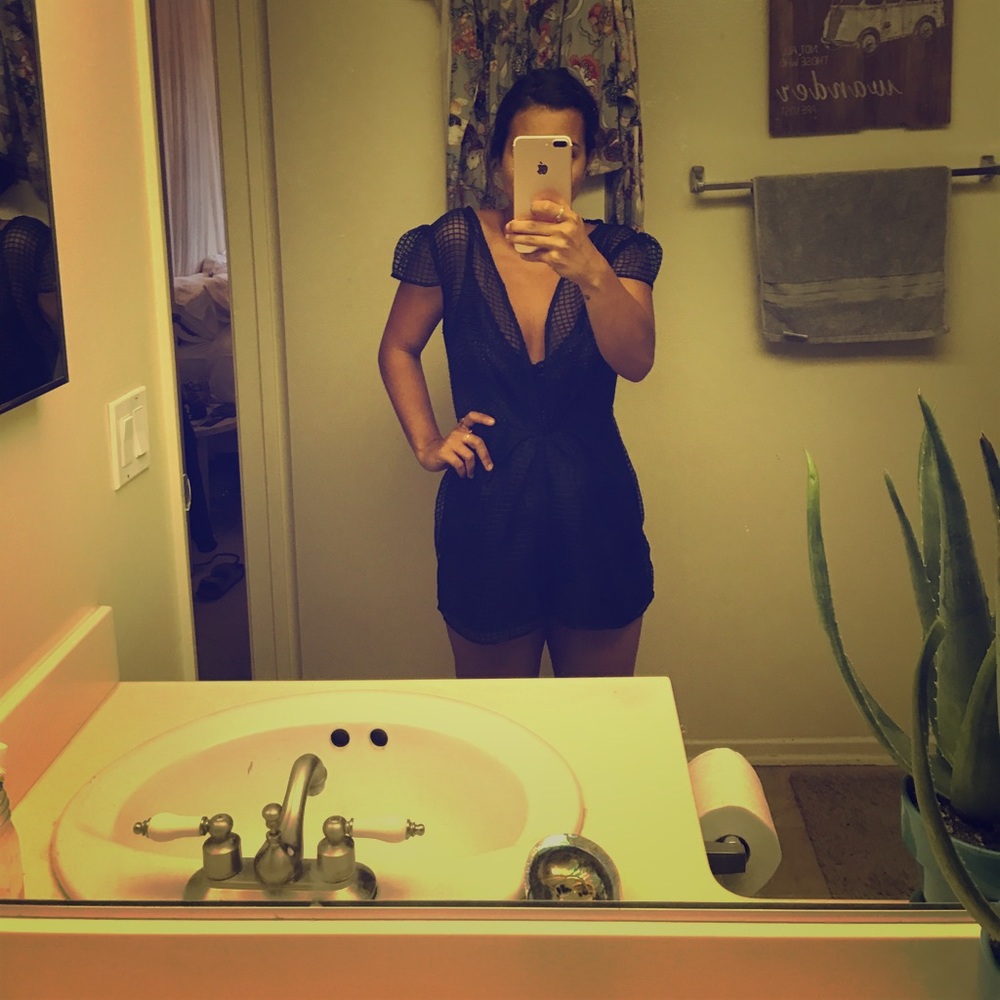 Sheer black romper, see through at the top!