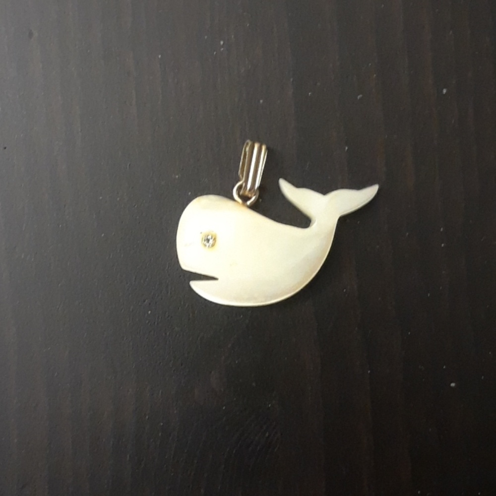 Ivory color iridescent whale pendant