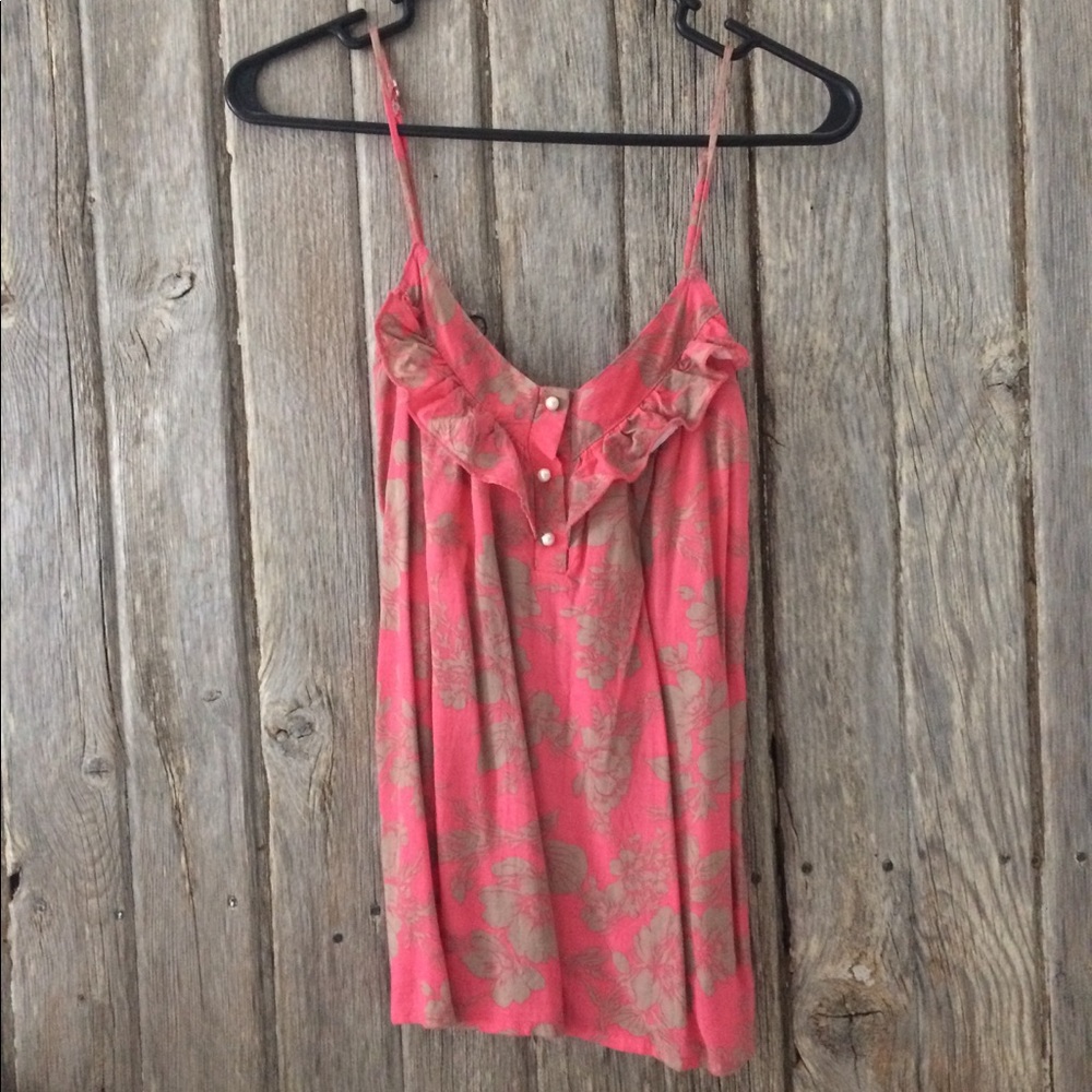 Ruffle tank with pearl button detail