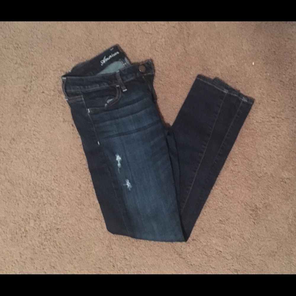 slightly ripped dark AE jeans