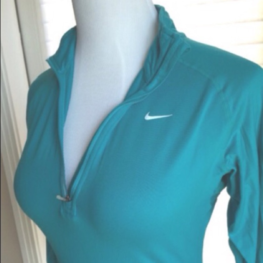 Nike 1/2 zip dri fit.