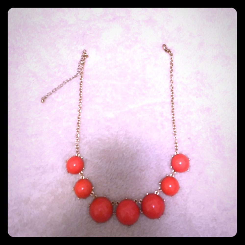 Orange necklace with gold detailing