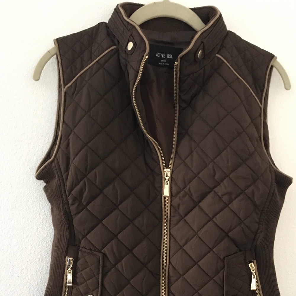 DONATED..brown zipper up vest