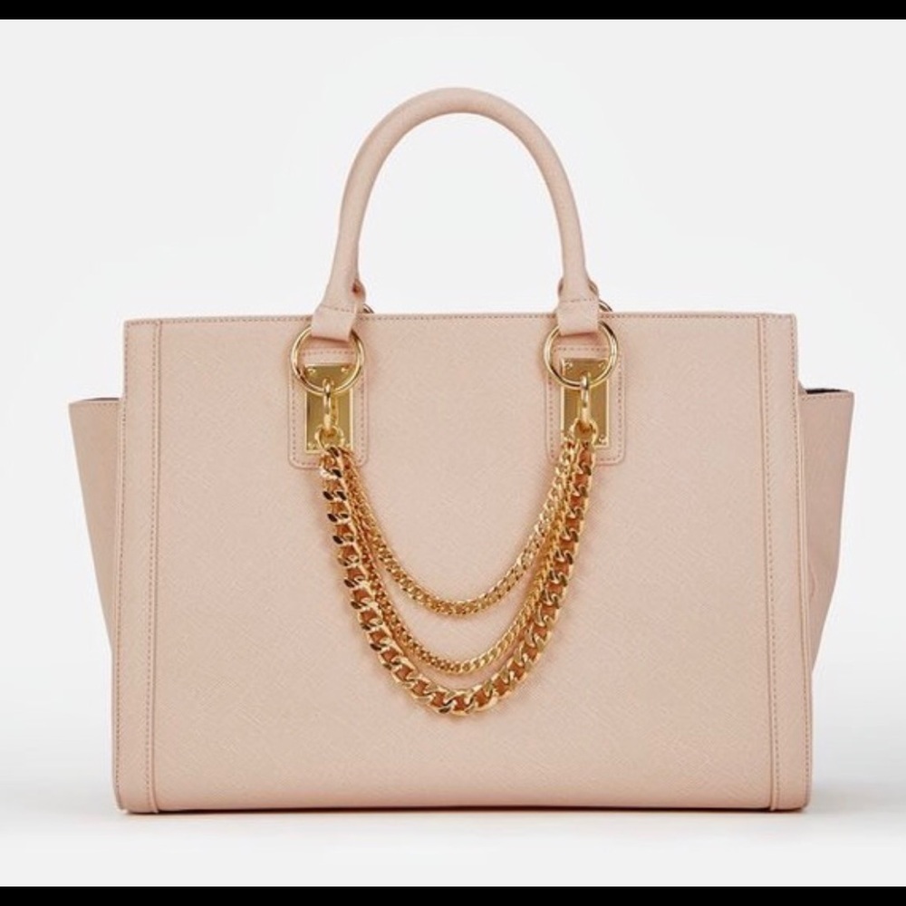 Blush pink handbag with shoulder strap