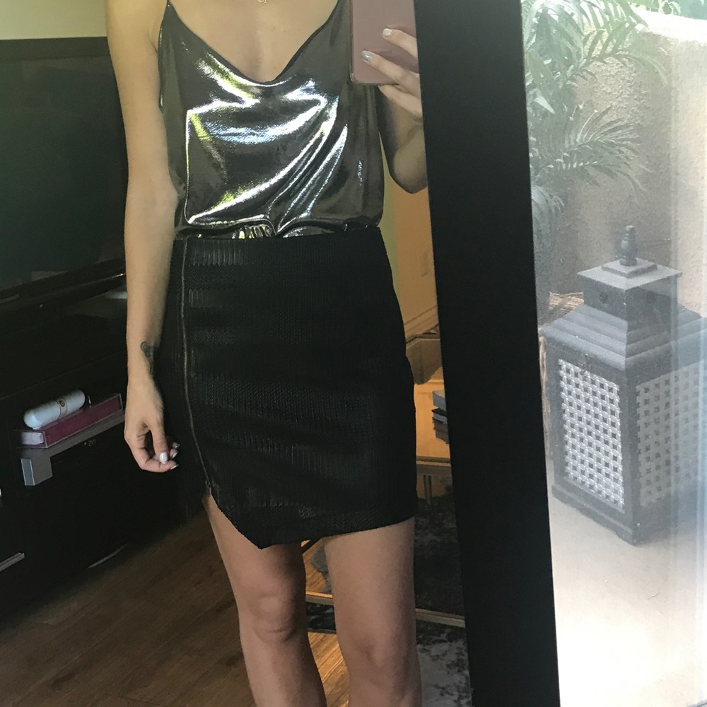Silver metallic tank.