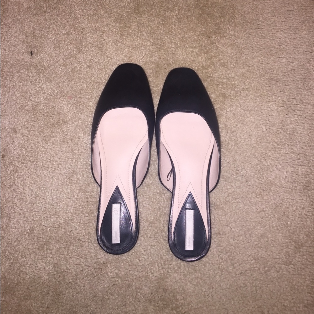 Black leather slip on shoes