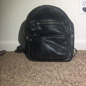 Black faux leather backpack