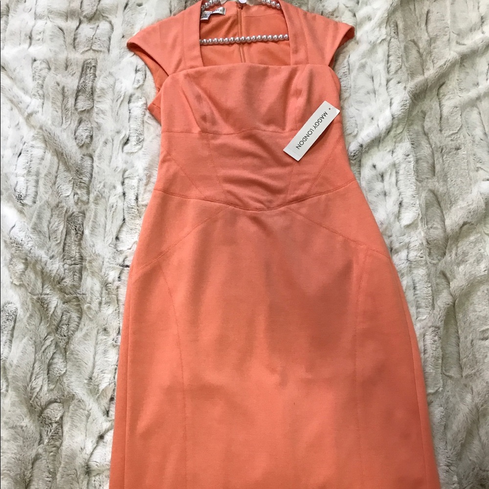 Dress. Apricot pleated on back.
