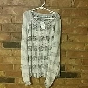 White and grey sweater