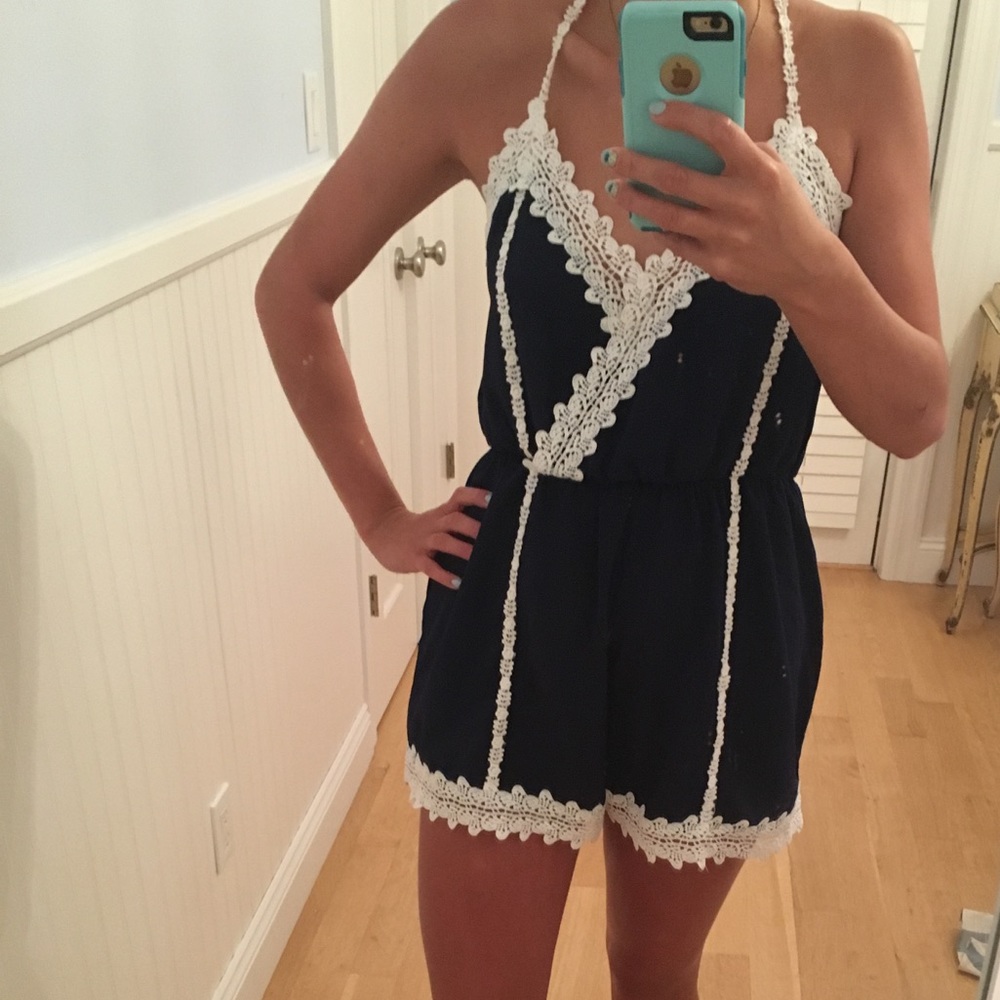 Blue romper white white lace trim