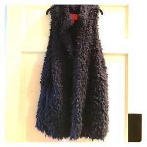 Long, shaggy navy vest