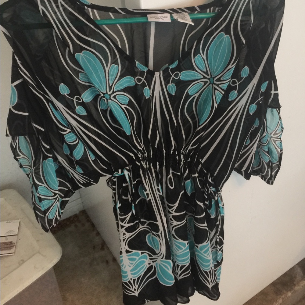 Black floral print blouse that ties in the middle